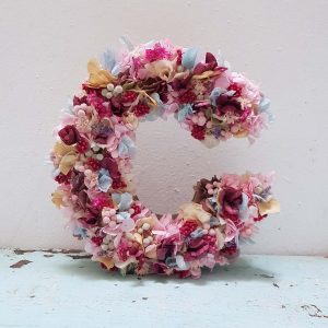 letras flor preservada tonos fucsias y azules intensos.jpg